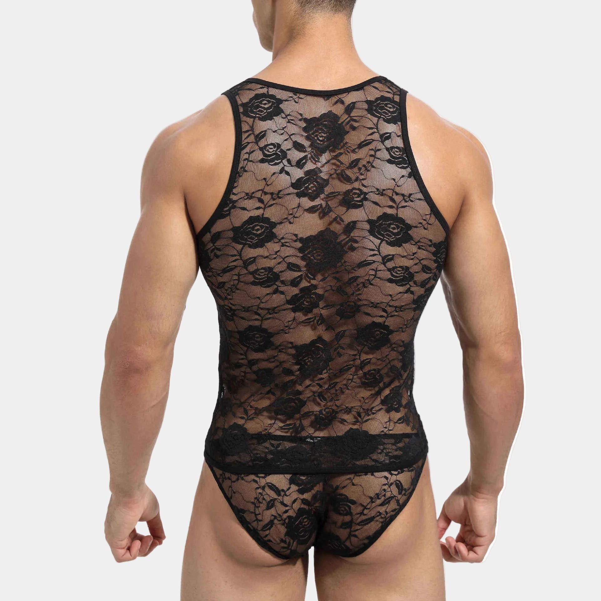 Black lace bodysuit worn by a person on a white background