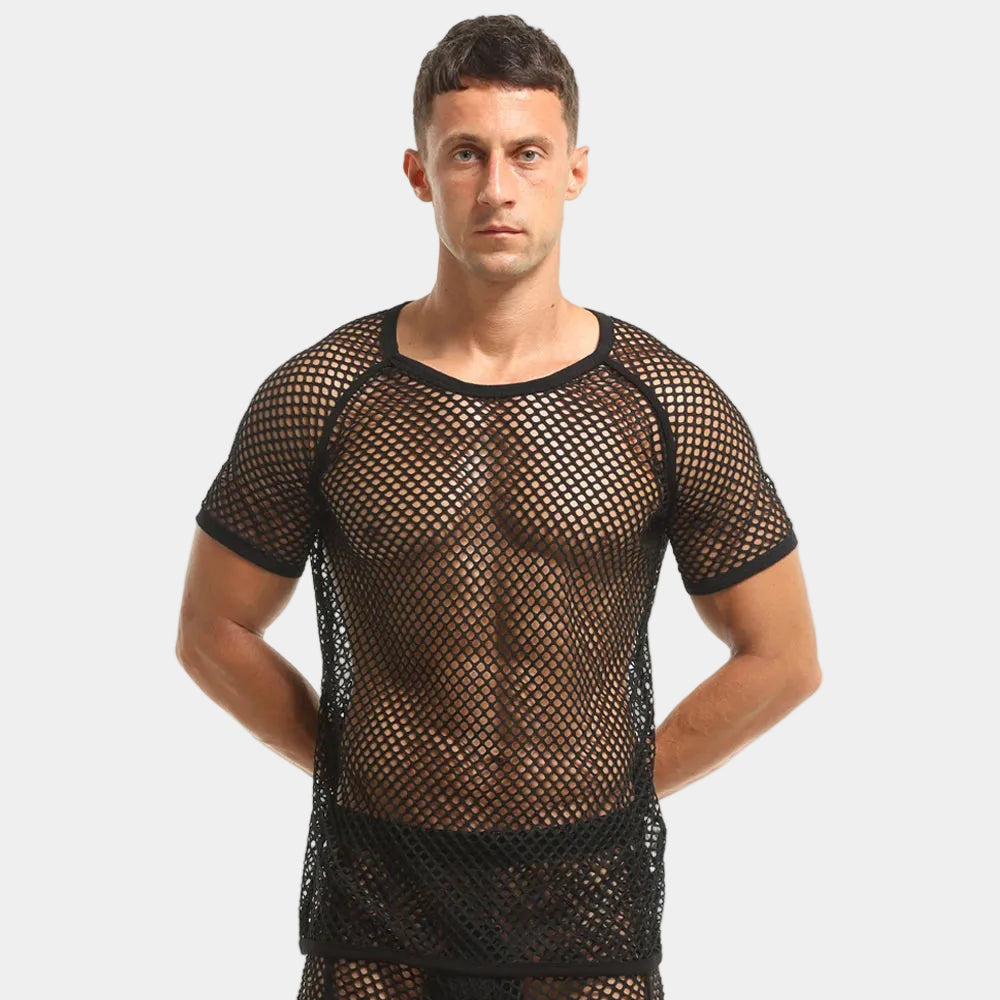 Man wearing a black fishnet outfit on a white background