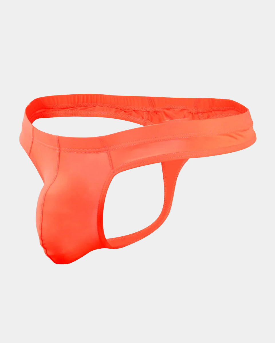 Neon orange men's underwear on a light gray background